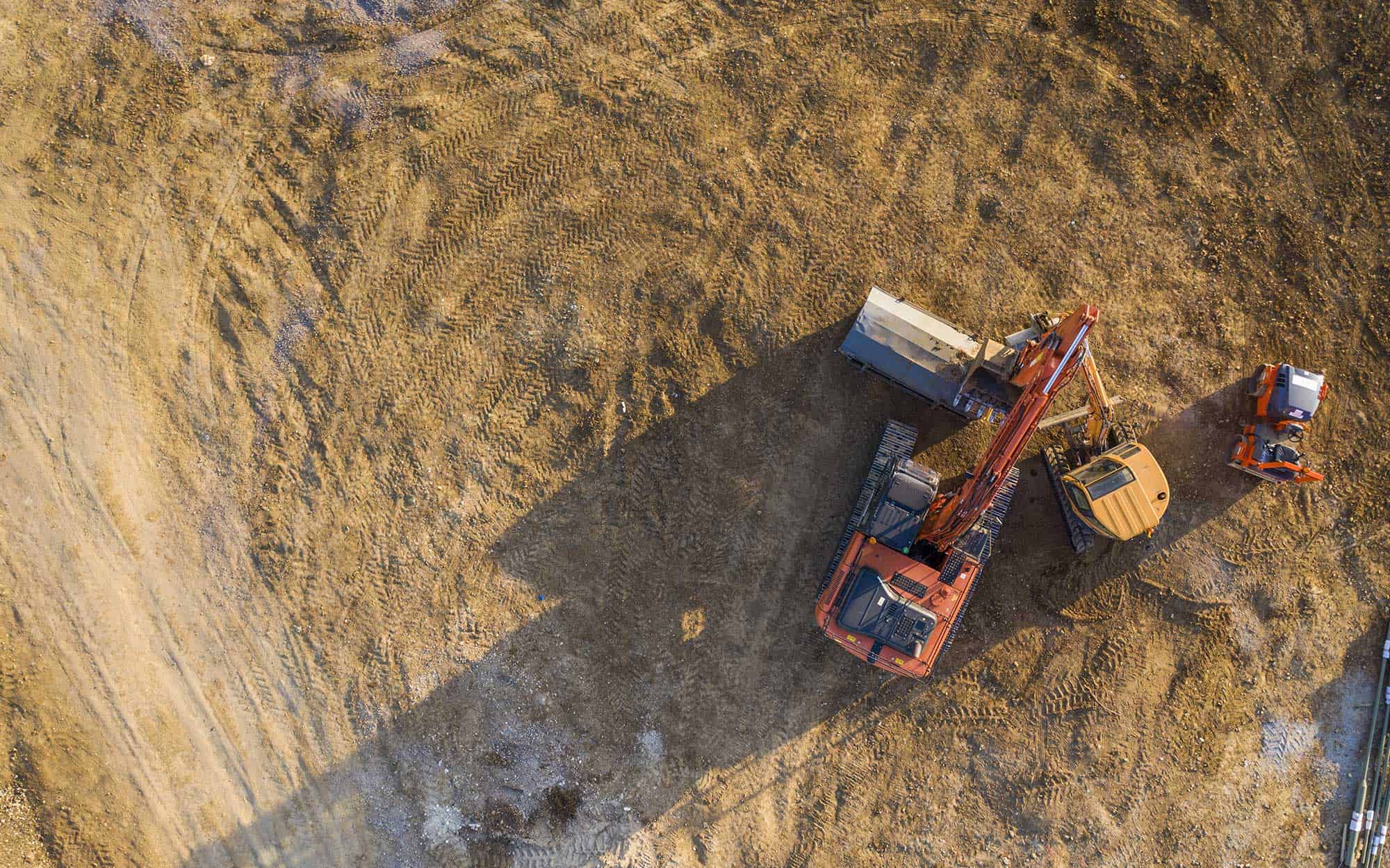 Overhead views of construction vehicles