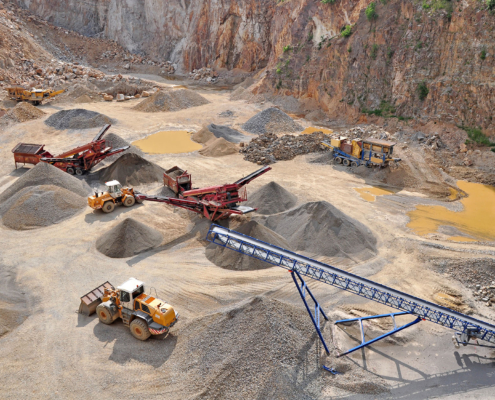 Aerial view of a quarry with large operating equipment