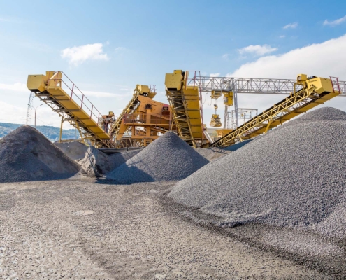 Side view of large machinery at quarry